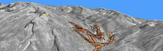 Three dimensional image of mountains draped with mining claims.